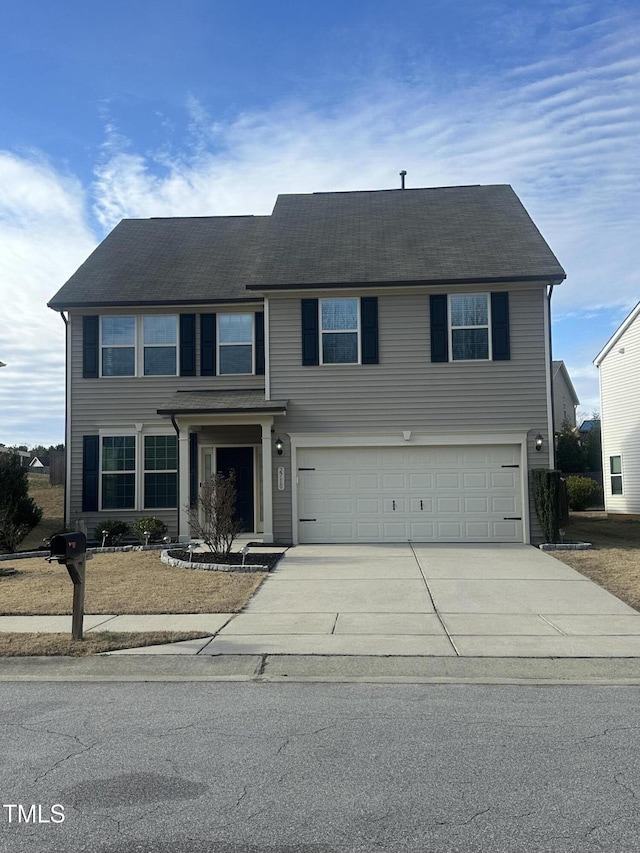 view of front of home with a garage