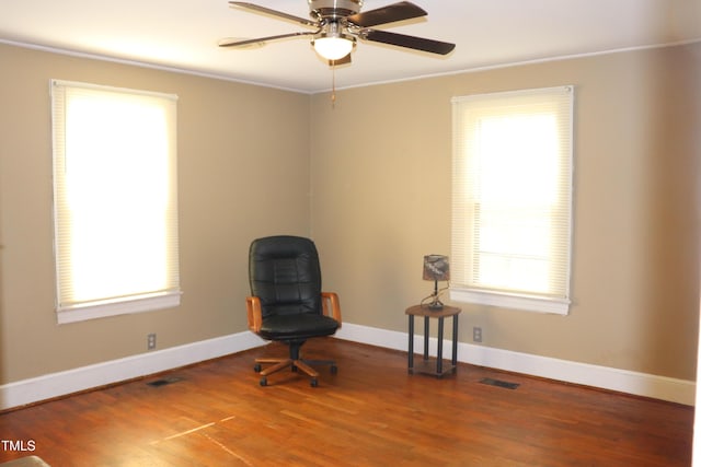 unfurnished room with ceiling fan, hardwood / wood-style floors, and ornamental molding