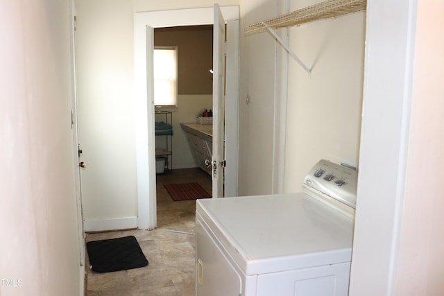 laundry room featuring washer / dryer