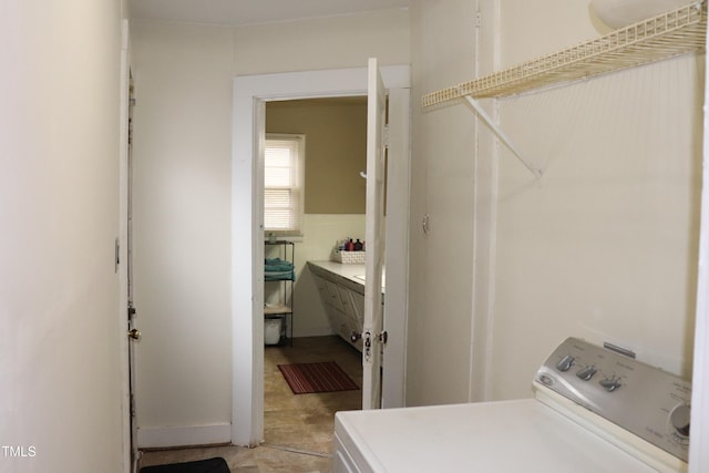 laundry area with washer / dryer