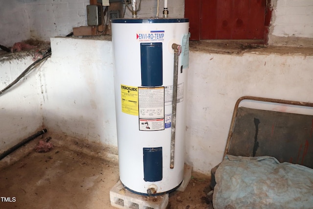 utility room featuring water heater