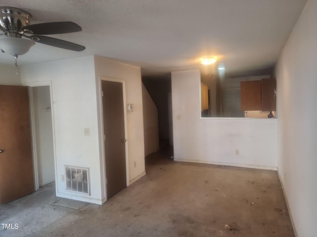 unfurnished room featuring ceiling fan