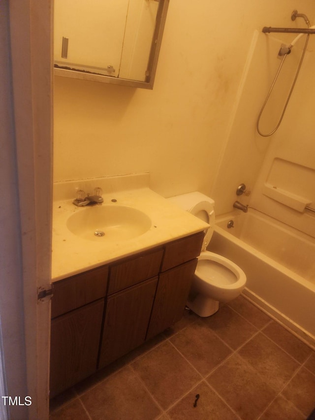 full bathroom featuring tile patterned floors, vanity, toilet, and tub / shower combination