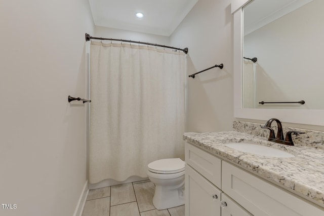 bathroom featuring tile patterned flooring, vanity, toilet, and crown molding