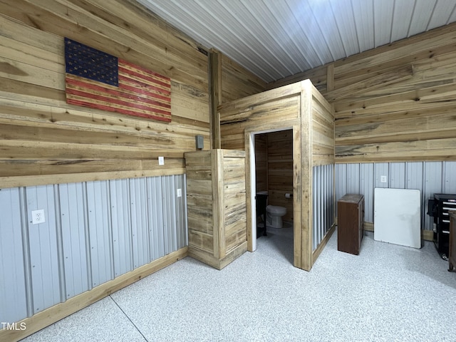 additional living space with wood walls