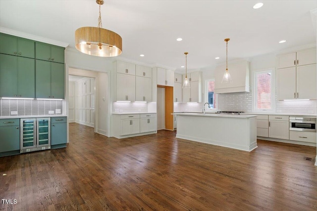 3302.5 Hall Pl, Raleigh, NC 27607 - kitchen with beverage cooler, white cabinets, and tasteful backsplash
