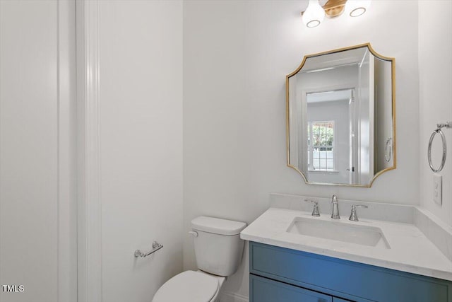 3302.5 Hall Pl, Raleigh, NC 27607 - half bath featuring vanity and toilet