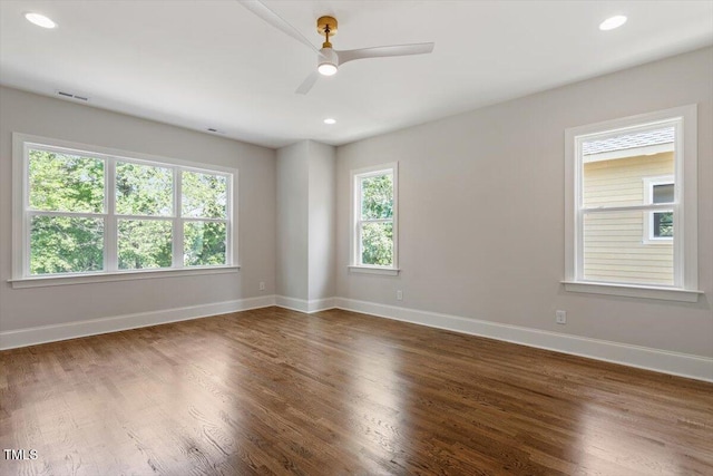 3302.5 Hall Pl, Raleigh, NC 27607 - spare room featuring baseboards, visible vents, and wood finished floors