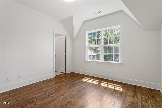 3302.5 Hall Pl, Raleigh, NC 27607 - bonus room featuring baseboards, visible vents, and vaulted ceiling