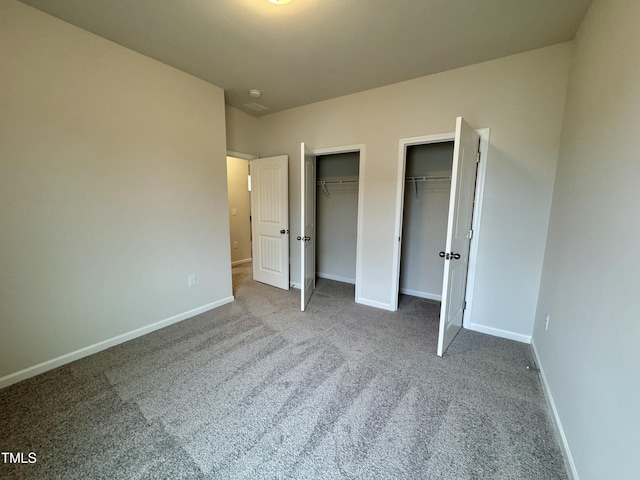 unfurnished bedroom with carpet floors