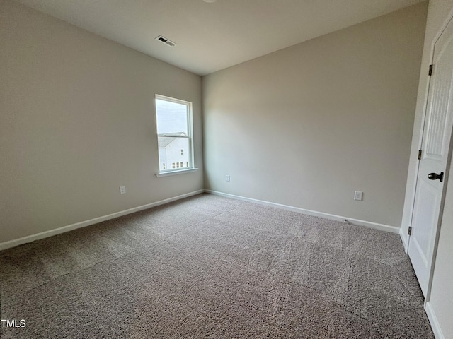 unfurnished room with carpet floors