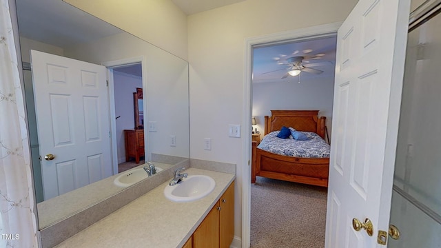 bathroom featuring ceiling fan and vanity