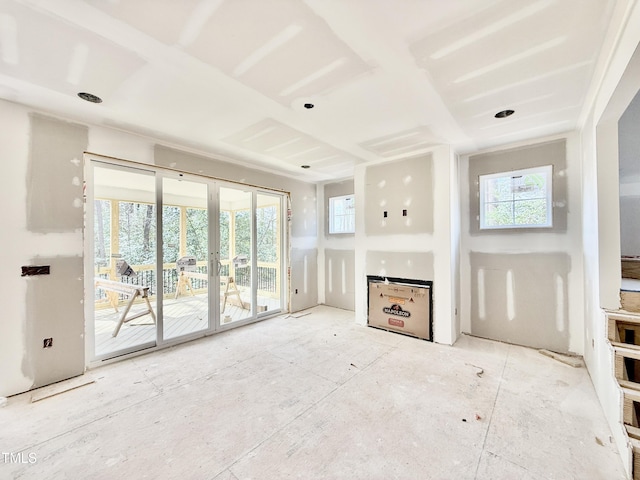 unfurnished living room with french doors