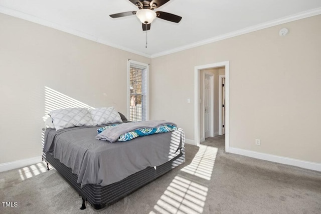 bedroom with ceiling fan, light colored carpet, and ornamental molding