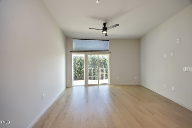 unfurnished room featuring ceiling fan and light hardwood / wood-style floors