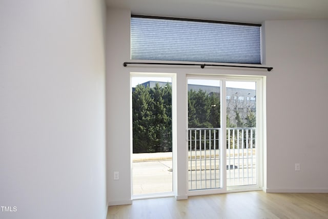 doorway to outside featuring light wood-type flooring