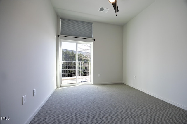 empty room with carpet floors and ceiling fan