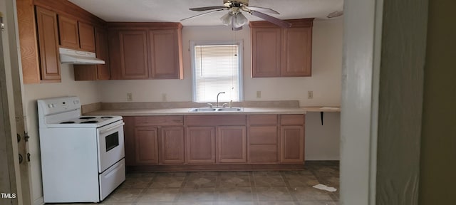 kitchen featuring ceiling fan, electric stove, and sink