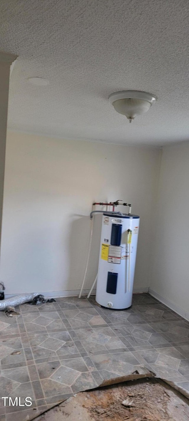 utility room featuring electric water heater