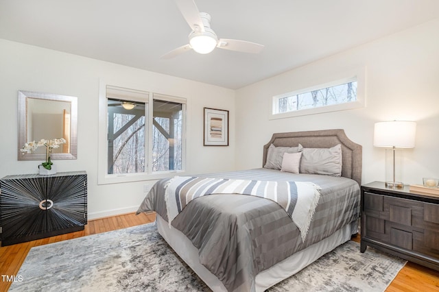 bedroom featuring ceiling fan and wood-type flooring