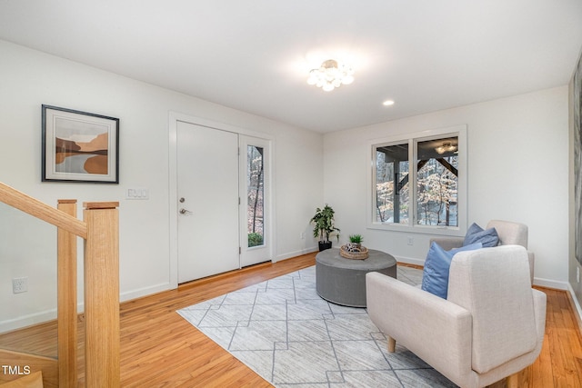 foyer entrance with hardwood / wood-style floors