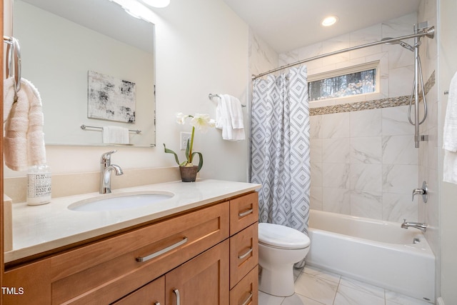 full bathroom with vanity, toilet, and shower / bath combo with shower curtain