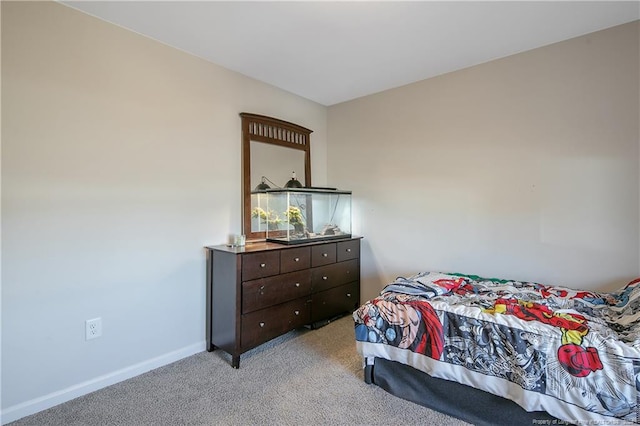 bedroom with light colored carpet