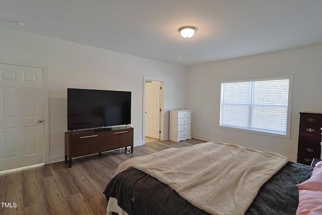 bedroom featuring light hardwood / wood-style floors