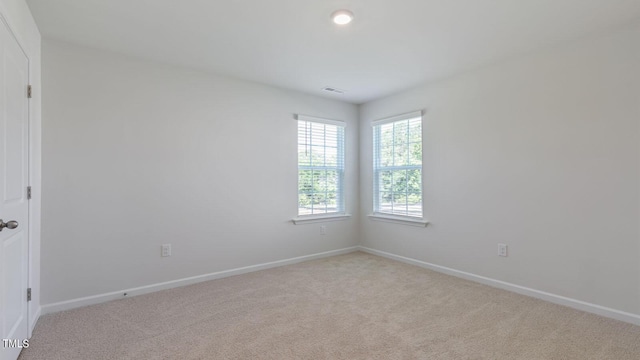 view of carpeted spare room