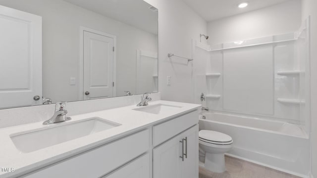 full bathroom with vanity,  shower combination, and toilet