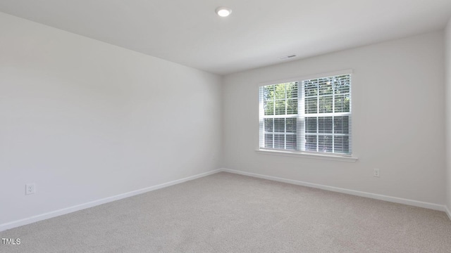 empty room featuring carpet floors