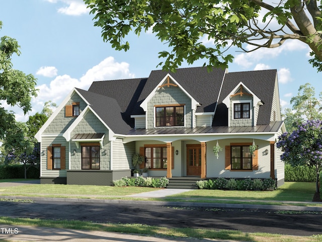 view of front facade featuring covered porch and a front yard