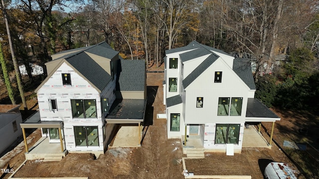 rear view of property featuring a patio area