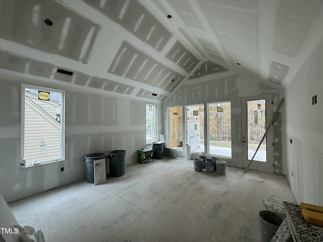 misc room featuring lofted ceiling