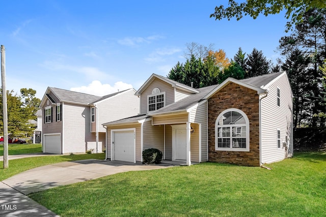 view of front of home featuring a garage and a front lawn