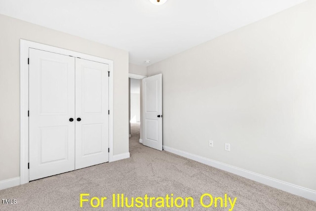 unfurnished bedroom featuring light colored carpet and a closet