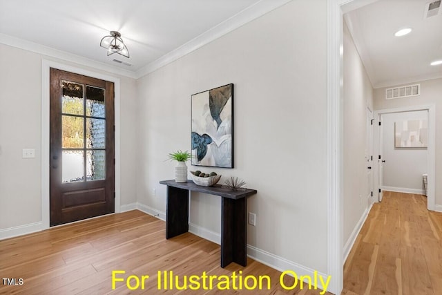 entryway featuring light wood-type flooring and crown molding