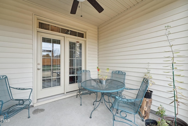 view of patio featuring ceiling fan