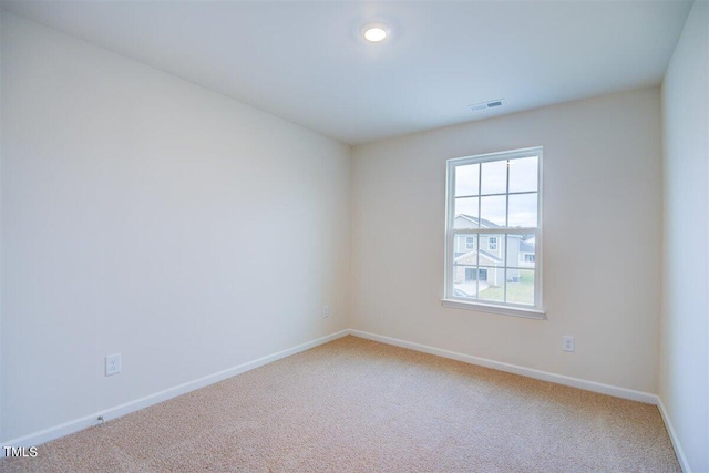 view of carpeted spare room