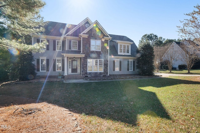 view of front of home featuring a front yard