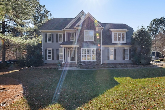 view of front of home with a front yard