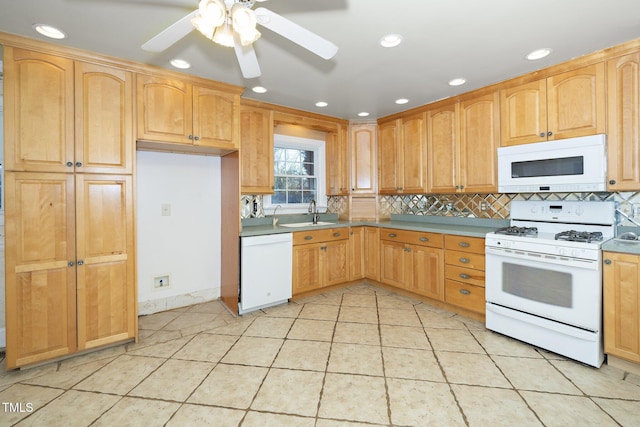 kitchen with backsplash, white appliances, ceiling fan, sink, and light tile patterned floors