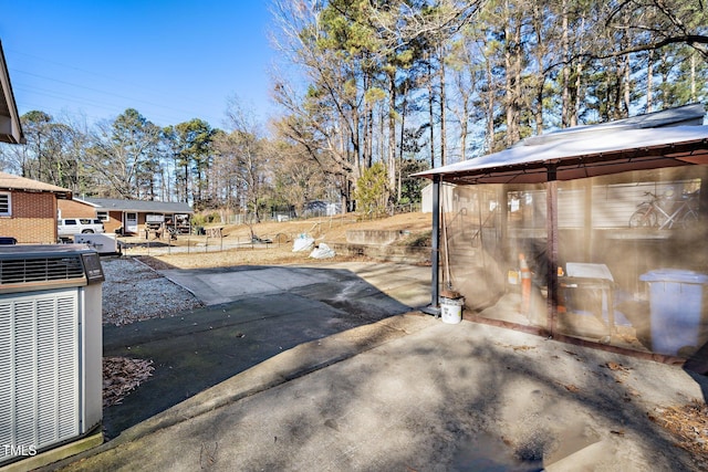 view of yard with central air condition unit