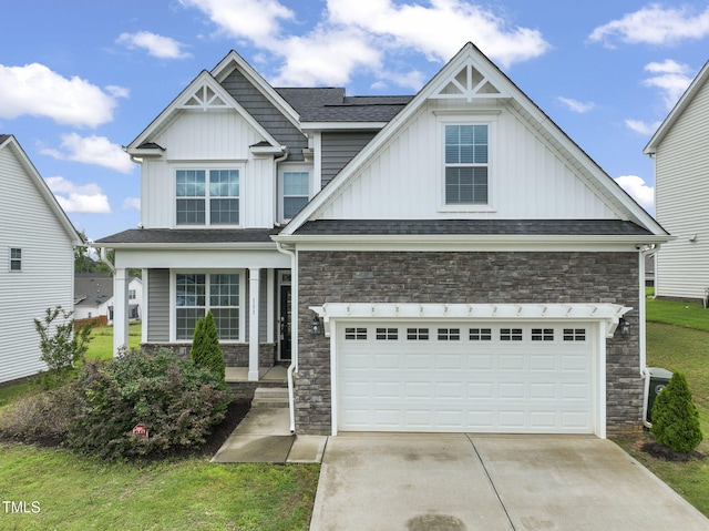 craftsman inspired home featuring central AC unit and a front lawn