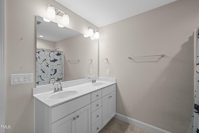 bathroom featuring tile patterned flooring, vanity, and a shower with curtain