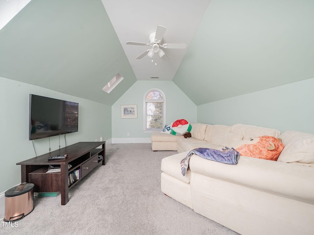 carpeted living area featuring lofted ceiling, ceiling fan, visible vents, and baseboards