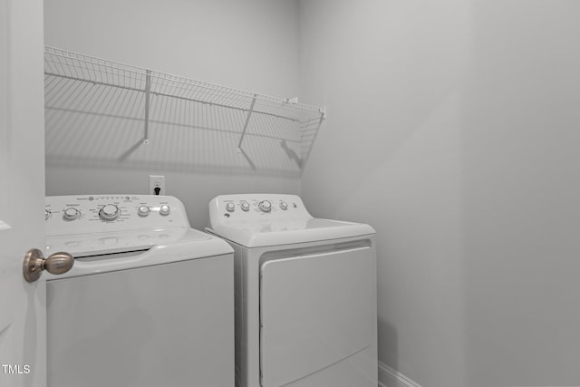 laundry room with washer and dryer