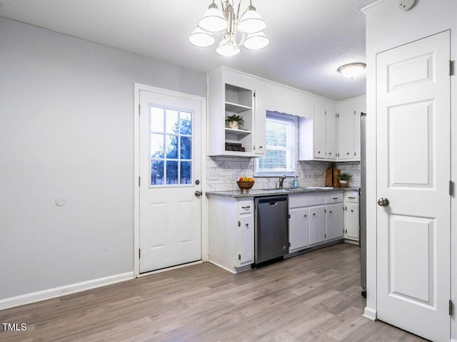 kitchen with an inviting chandelier, hanging light fixtures, light hardwood / wood-style floors, white cabinets, and stainless steel dishwasher