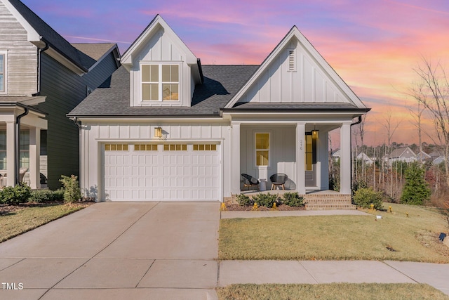 view of front of home with a lawn and a porch