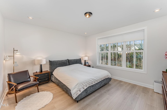 bedroom featuring light hardwood / wood-style floors